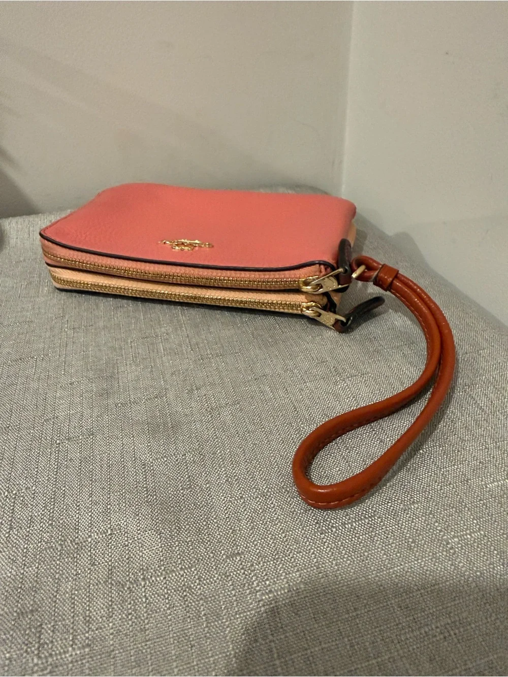 Coach Pink and Peach Two Tone Pebbled Leather Wristlet with Tan Strap